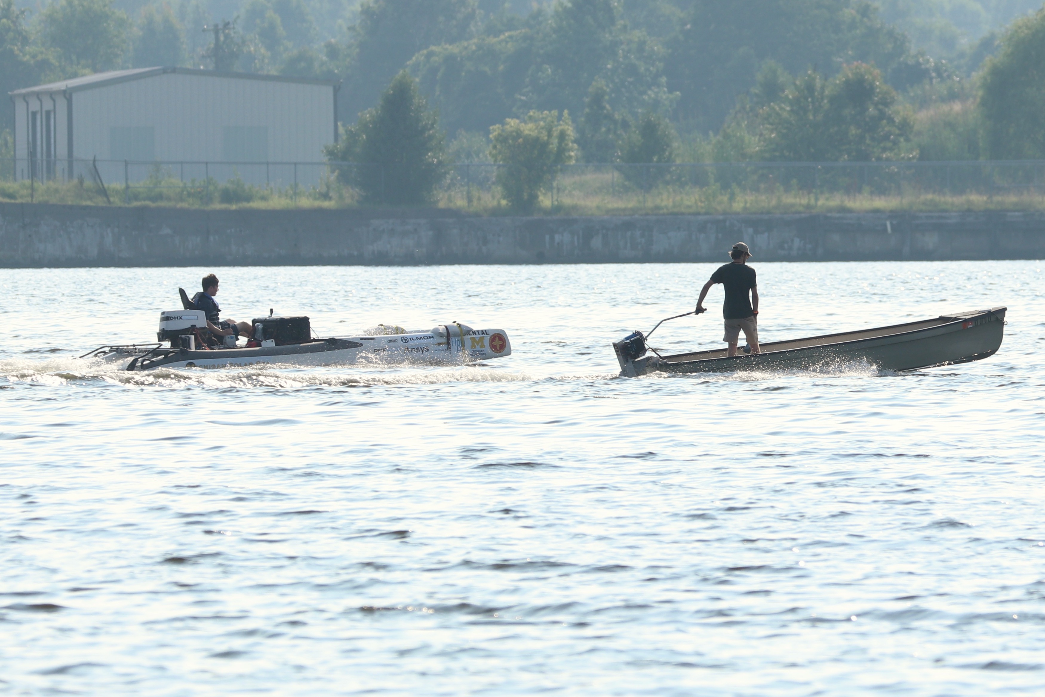 UMEB team racing their boat on the water